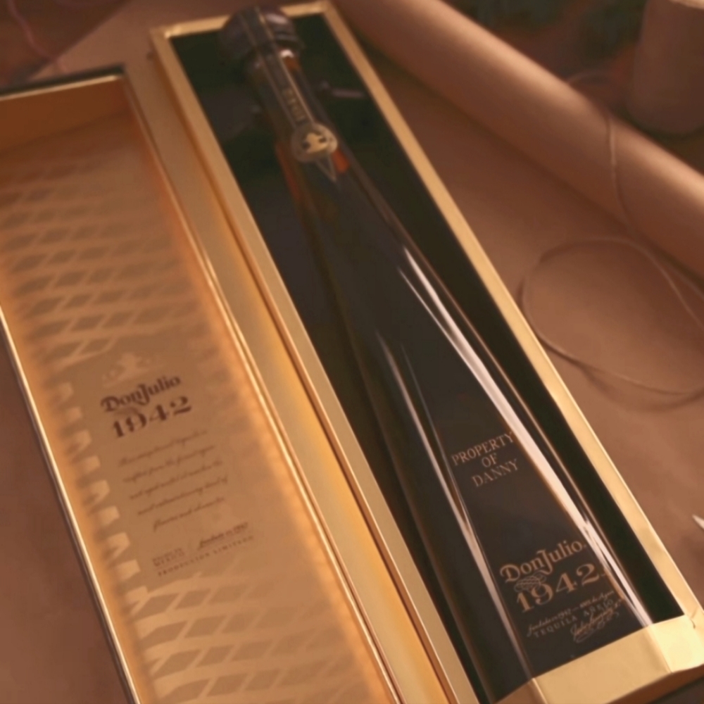 Don Julio 1942 empty bottle and gift box.